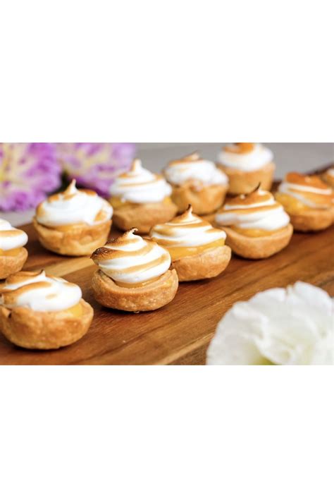 Allow to cool to room temperature, then add meringue powder and beat until stiff peaks form. Concise Bites | Lemon meringue tart, Catering, Food