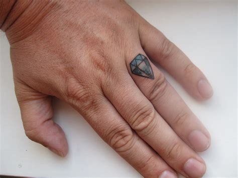 It is hard to get a real tattoo on fingers but an experienced tattoo artist can achieve it. Diamond Tattoos