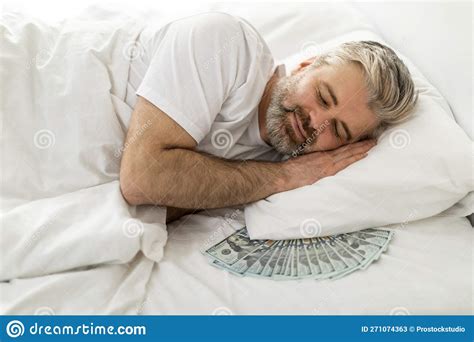 Smiling Bearded Man Sleeping With Bunch Of Cash Under Pillow Stock Image Image Of Mattress