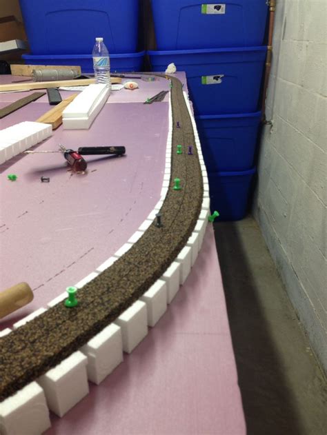 Closeup Of The Riser Installation And Cork Roadbed As The Glue Dries