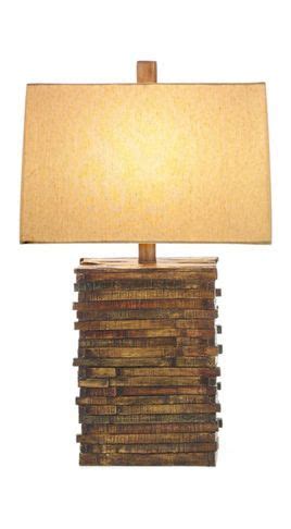 I planted them there before the hostas took over.. Lighting Products - Tuesday Morning | Wooden table lamps, Table lamp, Eclectic table lamps