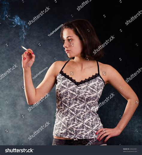 Young Pretty Girl Smoking A Cigarette Stock Photo 33422461 Shutterstock