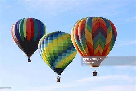 Three Colorful Hot Air Balloons In The Sky Stock Photo