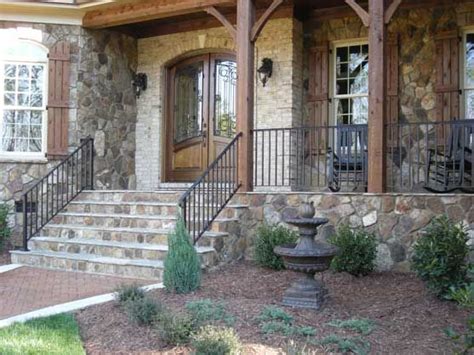 Modern wrought iron railings have allowed metal craftsmen more choices and the ability to manipulate iron rods into various intricate designs. Wrought Iron Designs Raleigh | Aluminum Gates, Railings ...