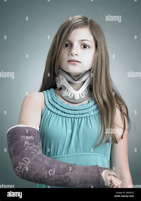 Girl With Neck Brace And Arm In Plaster Stock Photo Alamy