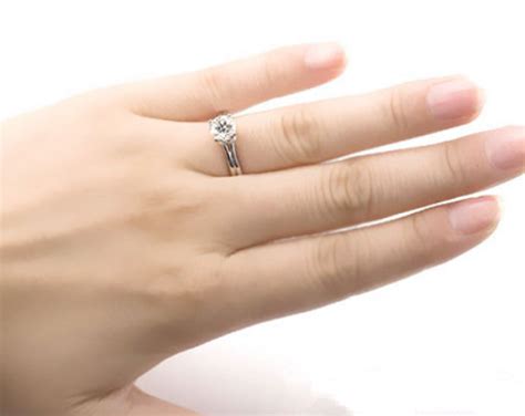 An engagement ring and wedding band receive less wear than if worn on the dominant hand. If women have a ring on their right hand, does it mean ...