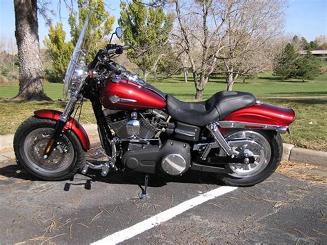 The fat bob rides well too; 2008 Fat Bob - Candy Red Sunglo - Harley Davidson Forums