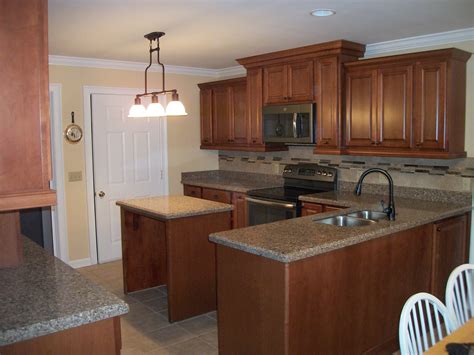 Maybe you would like to learn more about one of these? Remodeled kitchen features maple cabinetry, quartz ...