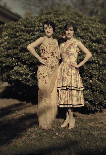 Two Women Of Spanish Ancestry Pose In Colorful Floral