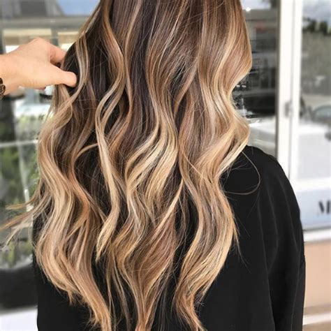 Chestnut brown hair with golden highlights. Chestnut Hair Color Ideas - Southern Living