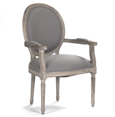 Dining arm chairs do tend to take up a little more room than side chairs so it's less common to find them around the rest of the table. Madeleine French Country Oval Grey Linen Dining Arm Chair ...