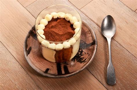 Coffee, chocolate bar, cocoa powder, vanilla extract, chocolate bar and 10 more. Homemade Tiramisu Dessert Topped With Cocoa Powder Stock Photo - Image of food, eggs: 124592106