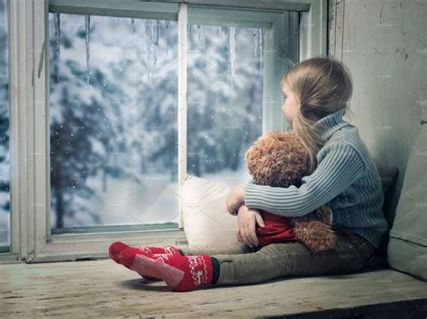 Little Girl Looking Out The Window Outside The Winter Snow ~ Holiday