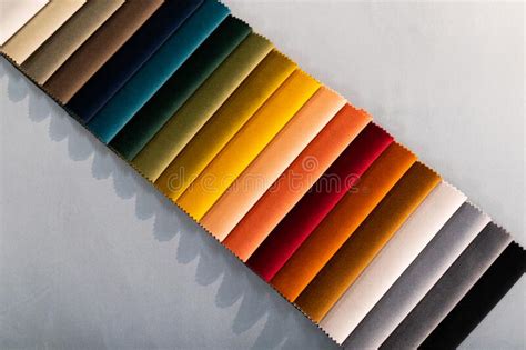 Catalog Of Multi Colored Fabric Samples Textile Industry Background