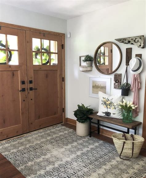 The bright white walls and doors are figuring out how to work with a small space can be difficult, which makes it vital to scope out what else you can work with. How to Create a Welcoming Summer Entryway | Entryway ...