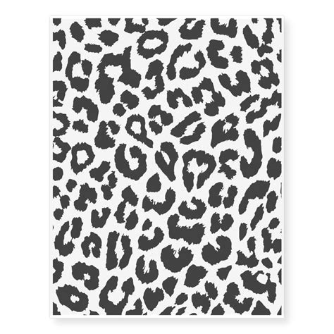 A Black And White Leopard Print On A Wall