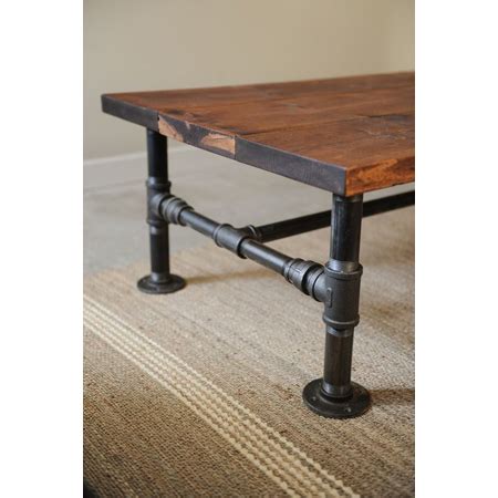 Fantastic industrial clothing rack for furniture decor ideas with industrial pipe. Industrial Pipe Home Decor DIY Projects - The Cottage Market