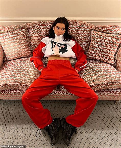 Dua Lipa Flashes Her Abs In Tracksuit Before Jumping On The Bed In Fun Social Media Snaps
