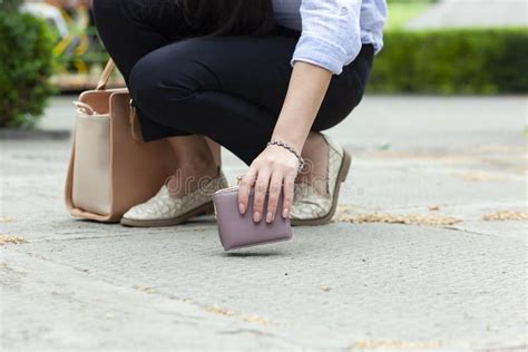 Woman And A Wallet On The Ground Stock Image Image Of Person Road