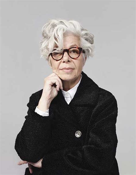 You can have so much fun with your bangs! modern-short-messy-curly-hairstyle-for-women-over-60-with ...