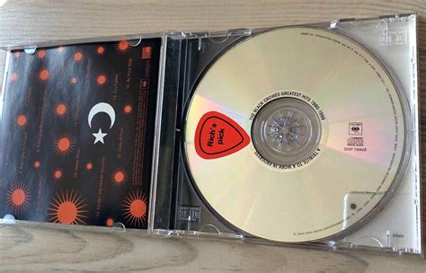 cd black crowes the greatest hits 1990 1999 a tribute to a work in progress 1ª ed usa