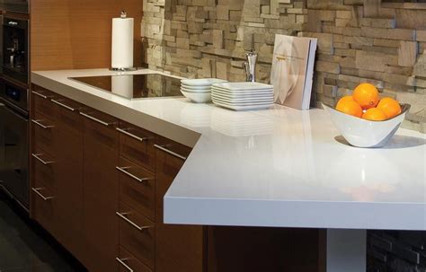 Cambria countertops have browns, golds, and grey mixed colors together with harmony. cambria torquay on white cabinets | cambria white cliff cambria sussex | Kitchen countertops ...