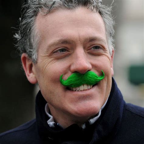 A Man With A Green Moustache Watches The 251st Annual Saint Patricks