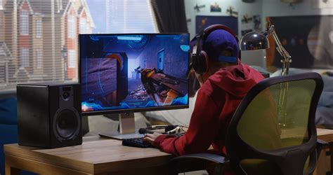 Medium Shot Of A Boy Playing With A First Person Shooter Video Game