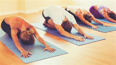 Decoding The Yoga Schedule What To Expect From 9 Common Class Types Mental Floss