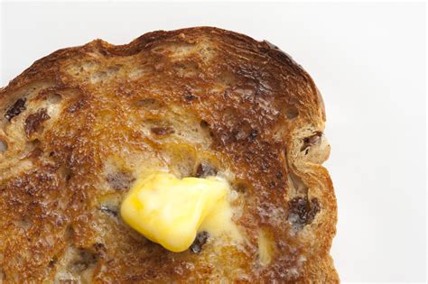 Melted butter on a hot slice of toast - Free Stock Image