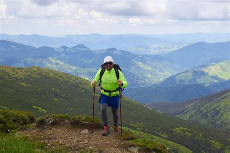 Man Traveling With Backpack Hiking In Mountains Travel Lifestyle