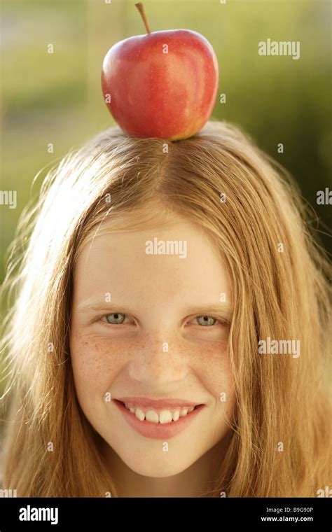 Girl Apple Head Balances Smiling Portrait Series People Child Blond