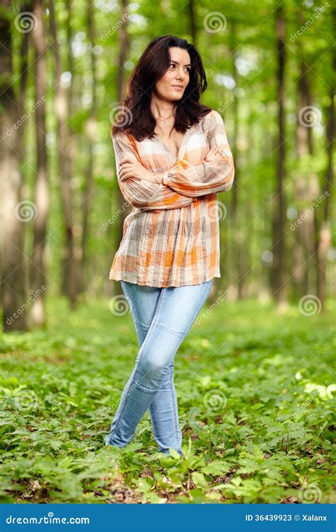 Beautiful Woman With Arms Folded In A Forest Stock Image Image Of