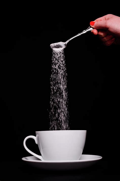 Pouring Sugar Photograph By Stock Colors Fine Art America