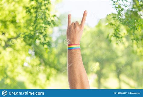 Hand With Gay Pride Rainbow Wristband Shows Rock Stock Image Image Of