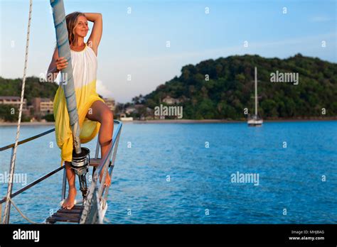 Sailing Boat Crew On Rest Happy Young Woman On Deck Of Charter Yacht