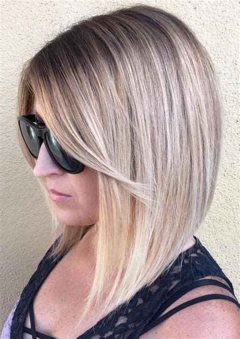 Feathered layers swirl around the. 25 Fantastic Easy Medium Haircuts 2021 - Shoulder Length ...