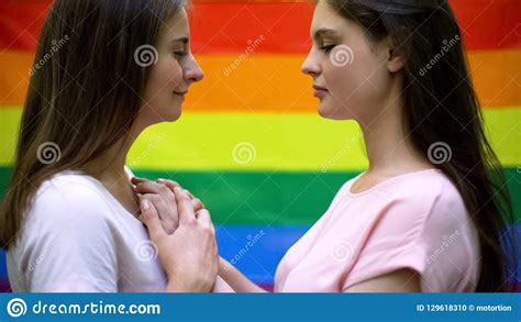 Cute Lesbian Couple On Rainbow Flag Background Same Sex Relations