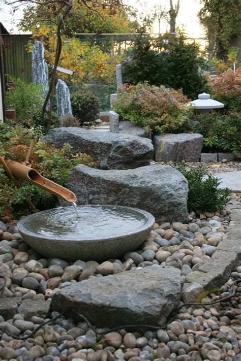 Our backyard garden is very small.maybe 6 feet by 12 feet and surrounded on three sides by a tall fence, so that only one side gets very much sunlight. Traditional Japanese tsukubai arrangement | Small japanese ...