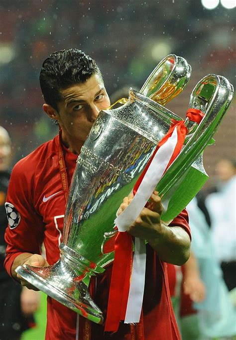 Cristiano Ronaldo Kissing The Champions League Trophy After The Uefa