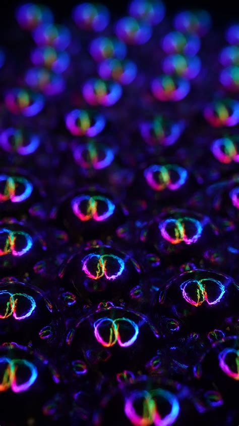 Download Wallpaper 1350x2400 Balls Neon Reflection Colorful Dark