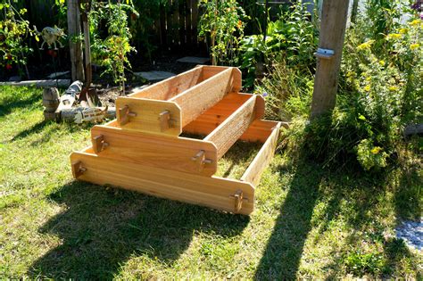 Most commonly, you can do this with some type of enclosure or frame made of wood, stone, bales of hay, or even repurposed material like old dressers. Raised Bed Patio Garden Planter Flower Box Herb Elevated ...