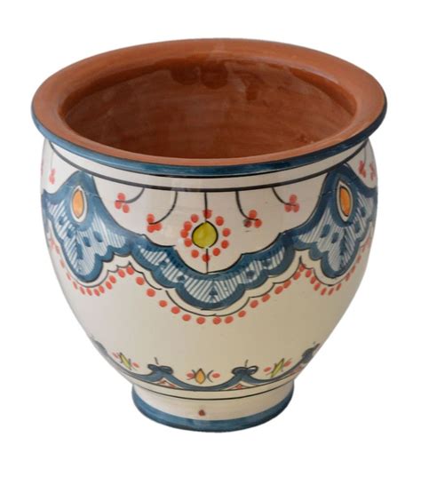 Spanish Style Terracotta Pots Using A Clay Pot Sealer On The Inside