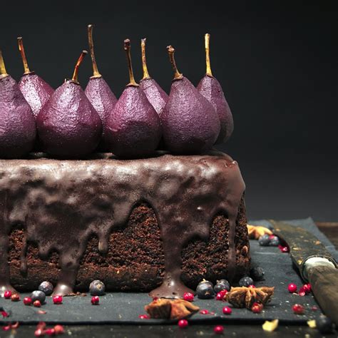 Spiced Hazelnut Cake With Poached Red Wine Pears And Chocolate Glaze By