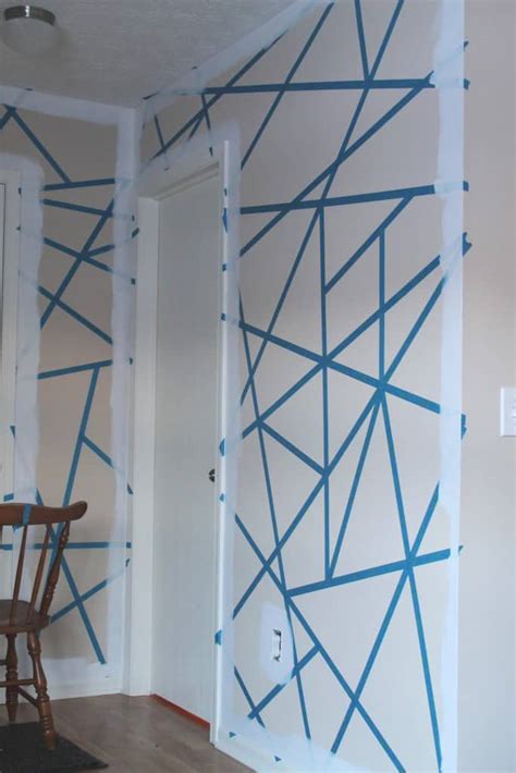 Painting accent walls is a great solution for those who want to dress up their living space but are not yet ready to commit to a full room's worth of color. DIY Painter's Tape Accent Wall | The Spiffy Cookie