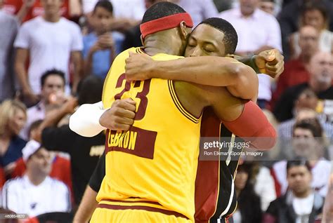 lebron james of the cleveland cavaliers hugs dwyane wade of the miami news photo getty images