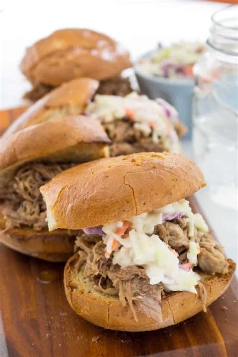 Remove from stove and allow mixture to cool to room temperature, then add the peach schnapps and grain alcohol. Moonshine Crock Pot Pulled Pork • Dishing Delish