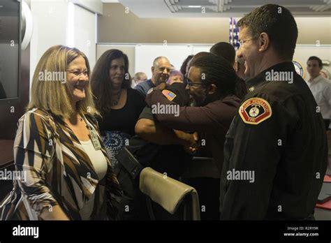 Guests Congratulate Awardees During A Meritorious Civilian Service