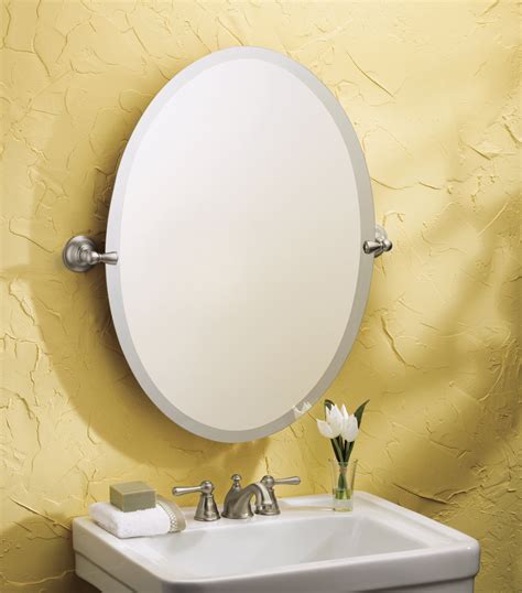 This large, tilting oval bathroom mirror is available in brass, nickel or chrome to complement your bathroom fittings. Moen DN6892BN Sage Bathroom Oval Tilting Mirror, Brushed ...