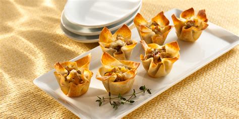 A delightfully innovative dessert of wonton wrappers filled with a nutty date mixture. Wonton Cheese and Sausage Appetizers | Sargento®